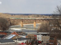 The Clouds roll in and its a race against time now. Perfect lighting conditions for VIA train 73 as it comes into frame, passing CN 331 on the south track over the Grand River in Paris, Ontario. 