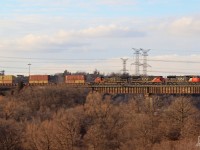 Panning CN 5689, CN 2121, CN 2707 as it leads CN Q148 east on the Halton Sub across the humber trestle. 