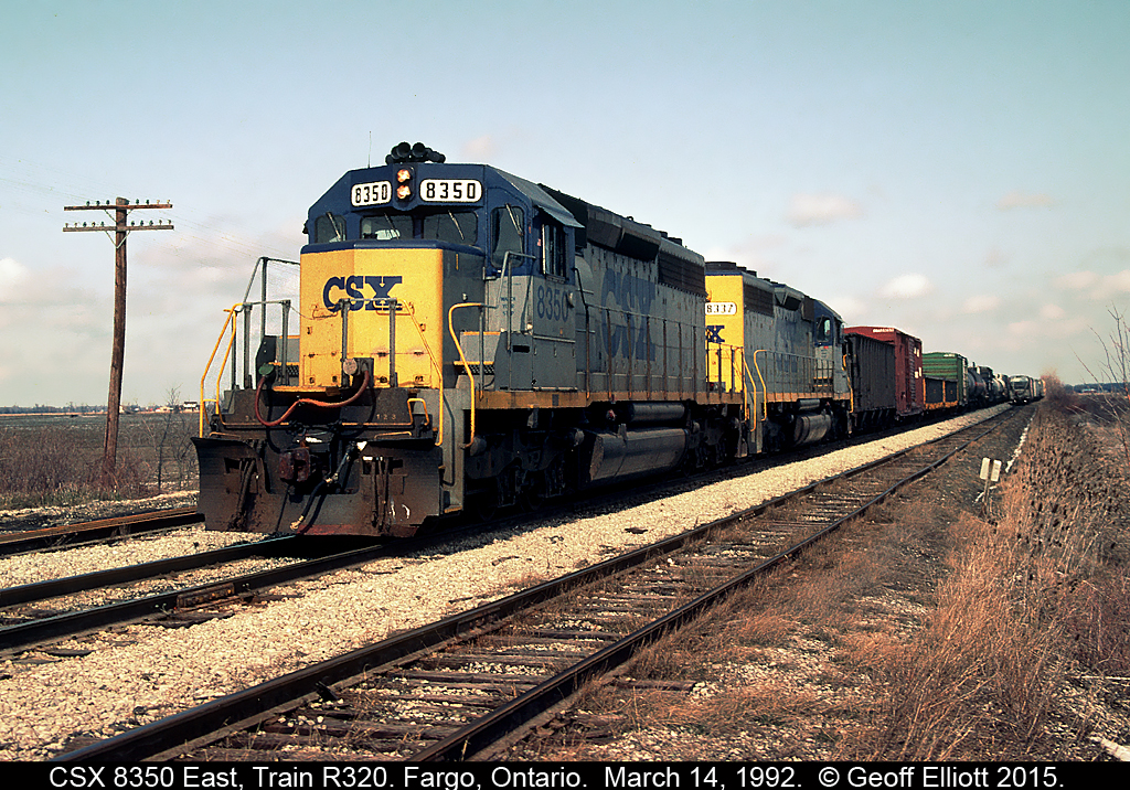 Up a little earlier with the train running a little late, that's how you'd catch CSX R320 at Fargo, Ontario in the morning.  Here a pair of CSX'd SD40's, with 8350 on the point, are arriving at the east end of Fargo siding.  Here R320 will setoff Sarnia bound cars and lift any Buffalo's out of the siding on the right (you can see their lift further down).  Miss these kind of days.