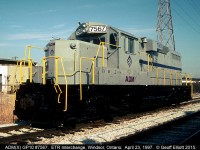 ADM(X) GP10 #7567, ex-Conrail same #, sits in the Essex Terminal/CP Interchange yard in Windsor waiting on the outbound Ojibway Job to lift it.  ADM(X) 7567 will move to ADM in Ojibway and switch cars only for a short time until it is put aside and replaced with a track mobile.  7567 disappeared almost as quickly as it came.  When this unit came into Canada in the week previous it travelled through the Windsor/Detroit Tunnel on NS Train #344, which passed by less than a 1/2 mile from here.  As NS and CP did not interchange in Windsor any longer at this point train 344 had to take this unit all the way to Welland, Ontario where it was Interchanged to the CP.  From there CP took it up to Guelph Jct., and the back west to Windsor to eventually be interchanged by the CP to the ETR.  Talk about taking the scenic route!!!!