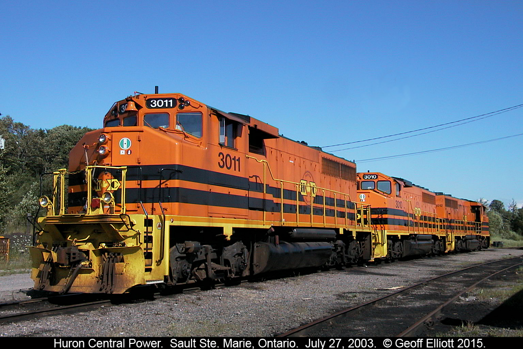 I'm not a big fan of the "Meatball" roads, but back in 2003 they were still fairly new to me and were something different to shoot.  Here 3 of the nicest looking ex-CN GP40-2W's, painted with the Huron Central 'meatball', rest on July 27, 2003 at the service facility in Sault Ste. Marie, Ontario after having arrived earlier in the day from Sudbury.  Can't beat a clear northern sky..........