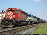 Dash 2's a plenty always seemed to be the 'norm' in the 80's and 90's on the Windsor Subdivision, but they weren't always this colorful.  Today we have a nice "elly-style" lashup with CP SD40-2 #5917 heading up IC&E 6443 (ex-UP 3705) and HLCX (ex-BN same #) 7003 on a westbound empty ethanol train as it waits on a new crew to take it from Canada into the U.S. via the Windsor/Detroit rail tunnel.