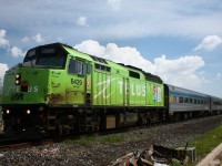 Out doing a little bit of railfanning, and this <b>VIA F40PH-2</b> pulls into the Georgetown station, decorated for Telus Communications.