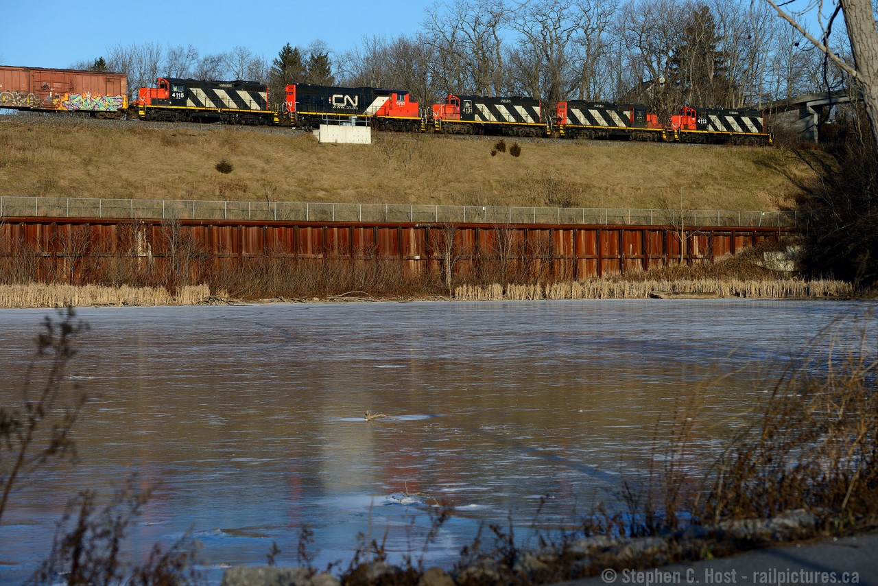 One of these things is not like the others, One of these things just doesn't belong, Can you tell which thing is not like the others. By the time I finish my song?  CN 550 has rescued 555 who died at Hamilton Junction, taking this interesting consist back to aldershot. Oh, so close.