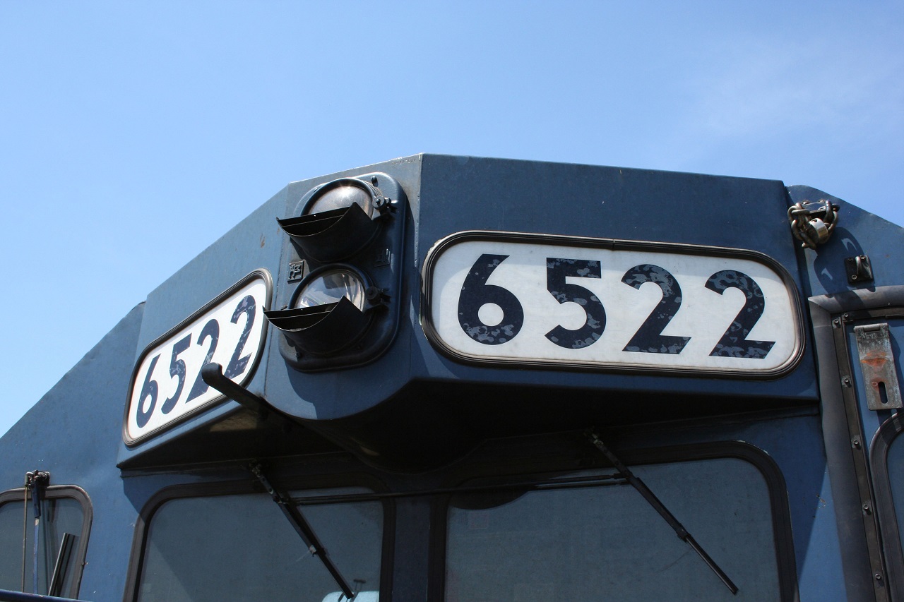 A view of HLCX 6522 number boards and headlights. This was taken on an excursion to Goderich in May 2008. At the time, GEXR acquired three six-axle HLCX maroon and blue locomotives: HLCX 6061, 6091 and 6522. From my understanding, these locomotives didn't last long on GEXR. More to follow...
