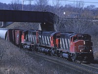 CN GP402W 9590 leads train #410 downgrade on the Dundas Sub passing under the CPR Hamilton Sub (I believe it was still the Goderich Sub at the time the photo was taken).