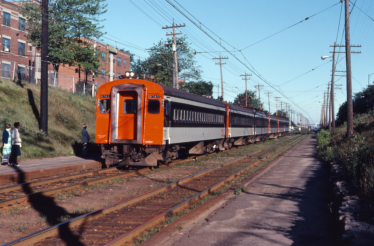 CN commuter train 902 arrives at the Mont Royal Station with a CC&F MU Electric Motor 6745 in charge of a 6 unit set.