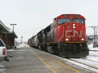 In 2003, several CN trains detoured over the GEXR Guelph Sub due to a derailment on the Dundas Sub. Five years later, it happened again. Maybe, there were times in between. But this time, I had my camera ready to catch some of the action. The date was Monday, February 18, 2008 and it was the first Family Day Monday (the first year the new holiday in Ontario and Alberta came into effect). Here we see CN 396 coasting through Kitchener at about 20-30 km/h with a good train. The power was CN 5652 and IC 1024. There was another train after this one with CN/IC-BNSF power. It's cool to see these massive trains going through Kitchener.