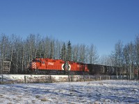 CP GP38-2 3076 leads the Breton Turn west. The Breton Turn originated at South Edmonton and ran as far west as needed on the Breton Sub. The Breton Sub left the Edmonton - Calgary mainline at Leduc. 