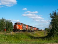 Got a tip from another railfan this consist was headed out on the Westlock sub.  I headed up to Morinville as I've shot from this location before and knew the sun would be decent.  Was surprising to see this much power on this sub.  Apparently it was a power move, but all units seemed be be running.