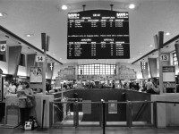 <b>Boarding VIA 14 on track 13.</b> Built by CN and owned by CN from 1942 to 2007 (it's now owned by Homburg Canada), Central Station in downtown Montreal is undoubtedly Montreal's busiest train station and Canada's second busiest, after Toronto's Union Station. It is served by AMT commuter trains to two destinations (Deux-Montagnes and Mont St-Hilaire) as well as VIA and Amtrak trains. At right is a sign for the 6:55 PM departure of VIA 14, 'The Ocean' for Halifax. In the middle is the arrival and departure board.