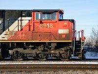 <b>I heart CN Except Me!</b> So says the message inscribed into the dirt on the cab of CN 8918 as it leads an eastbound through Dorval.