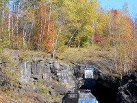 VIA 600/604, the combined train from Senneterre and Jonquière is passing one of CN's few tunnels in northern Quebec with VIA 6435 leading as it passes through Shawinigan, on its way to Montreal.