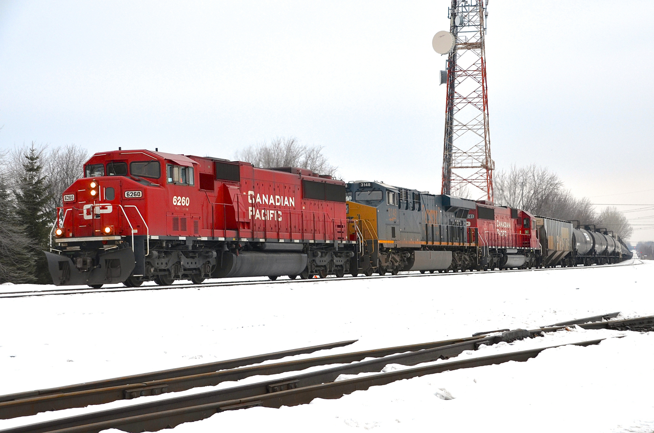 CP 642 with an incredible lashup and a rare ex-SOO SD60M leading (CP 6260-CSXT 3148-CP 6241) is passing the Lasalle Yard just before leaving the island of Montreal.