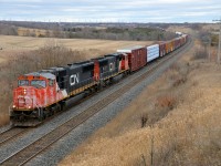 CN 5631 & CN 5654 lead CN X371 through Newtonville.