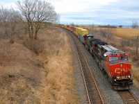 CN 2587 and another Dash9 lead CN 149 through Lovekin.