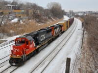 A longer than usual CN 323 (274 axles) is almost done for the day as it passes through Montreal West with CN 5487 & CN 9675 (ex-GOT 708).