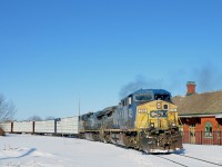 A late CN 324 with an incredible lashup consisting of CSXT 292 and IC 2457 is passing the old Grand Trunk station in St-Jean-sur-Richelieu on a very sunny but very cold morning. In tow are 60 cars for St. Albans, Vermont and interchange with the New England Central Railroad.