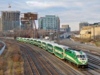 GOT 635 pushes a 10-car train westwards just west of the Bathurst avenue overpass during a brief sunny spell.