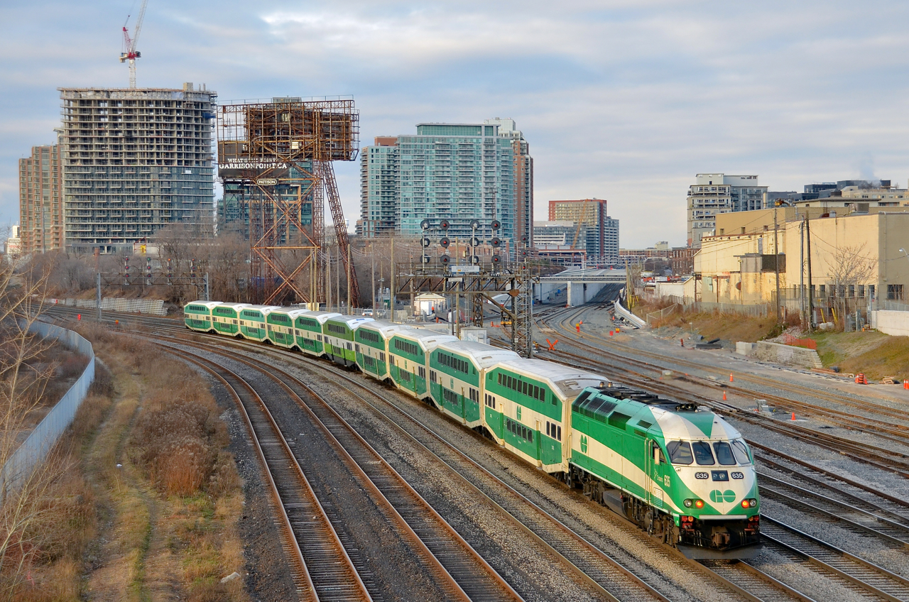 GOT 635 pushes a 10-car train westwards just west of the Bathurst avenue overpass during a brief sunny spell.