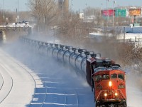 CN 711 speeds through Montreal West on the south track of CN's Montreal sub with CN 2443 leading.
