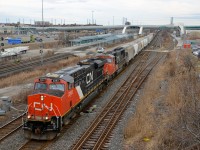 CN 2283 & CN 5666 lead CN 369 west through Pickering. Soon the train will leave the Kingston sub for the York sub.