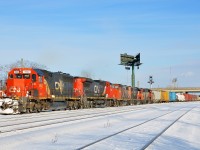 <b>What a lashup.</b> CN 527 departs Southwark Yard in St-Lambert with 5 units, including a GTW leader (GTW 5932, CN 2136, CN 4784, CN 4720 & CN 4803). The last three units were taken off of CN 393 which unusually terminated at Southwark Yard. Next stop is work at Pointe St-Charles yard and then to Taschereau Yard.