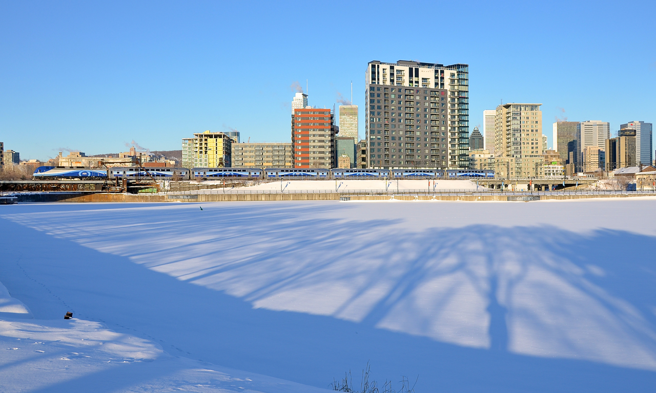 It's about -20C but completely clear as AMT 809 passes the frozen Peel Basin on its way towards Montreal's Central Station.