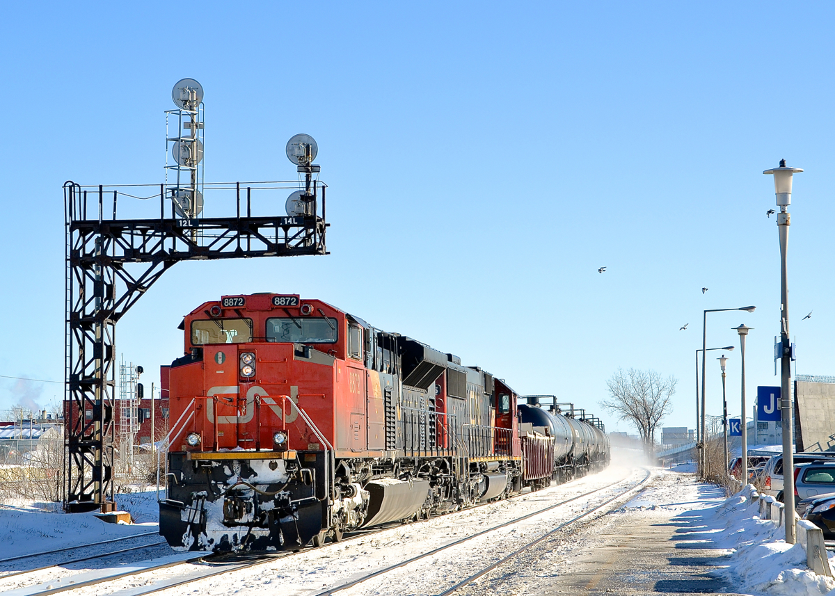 A late CN 305 heads through Dorval with CN 8872, CN 5445, CN 8904 DPU.