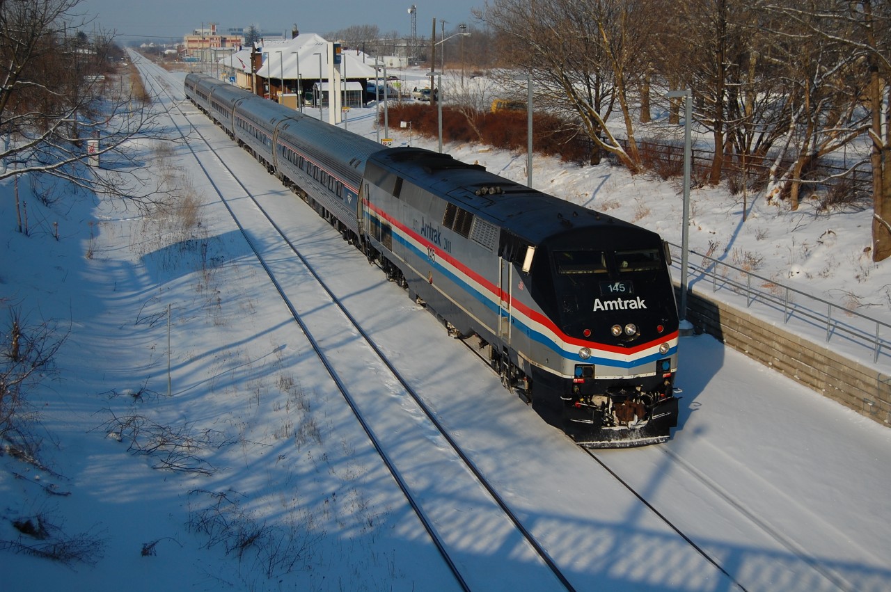 A Heritage unit leads VIA 97 on cold winter day at St. Catharines.