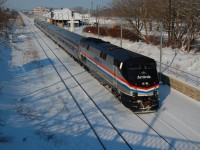 A Heritage unit leads VIA 97 on cold winter day at St. Catharines.
