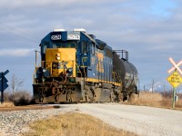 CSX2574 crosses Baseline Road near Sombra after a switch at Air Liquide on Bickford Line.