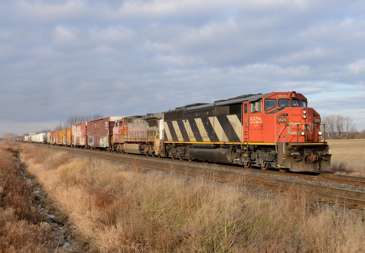 Train 332 east bound at Waterworks Sideroad with CN5525 and BNSF943.