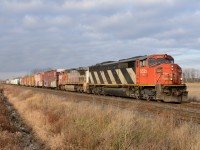 Train 332 east bound at Waterworks Sideroad with CN5525 and BNSF943.
