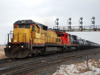 CN 331 departs Paris West with yellow CN 2018 and better looking sister CN 2016 after lifting 9 cars off the north service track.