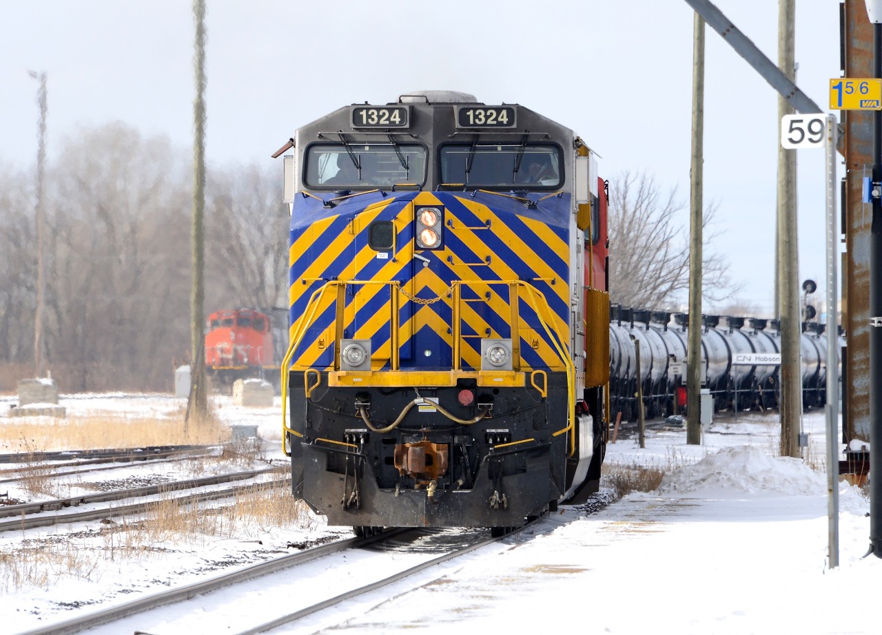 CREX1324 leads train 710 into Sarnia with CN5661 and CN2542.