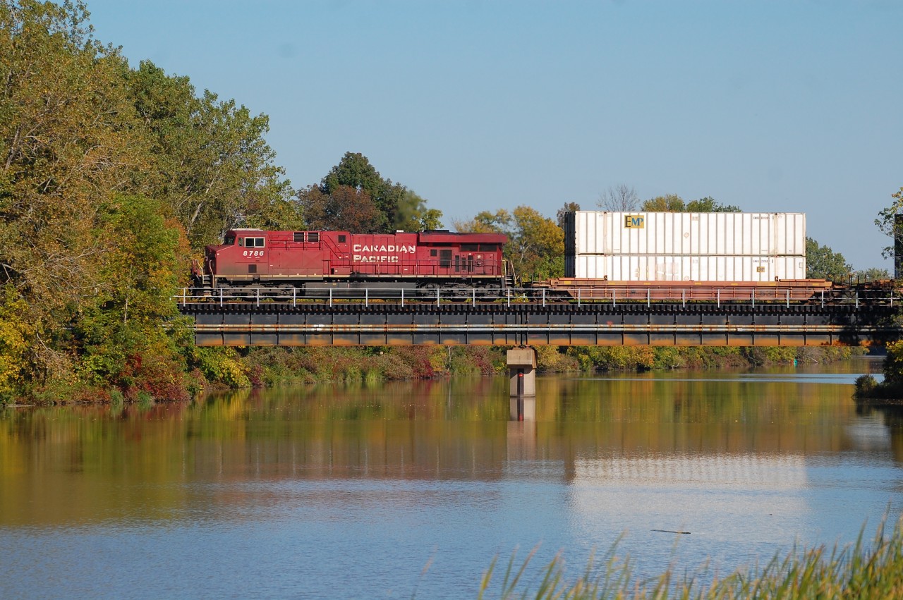 142 departing Welland makes it way across the Welland River on route to Kinnear.