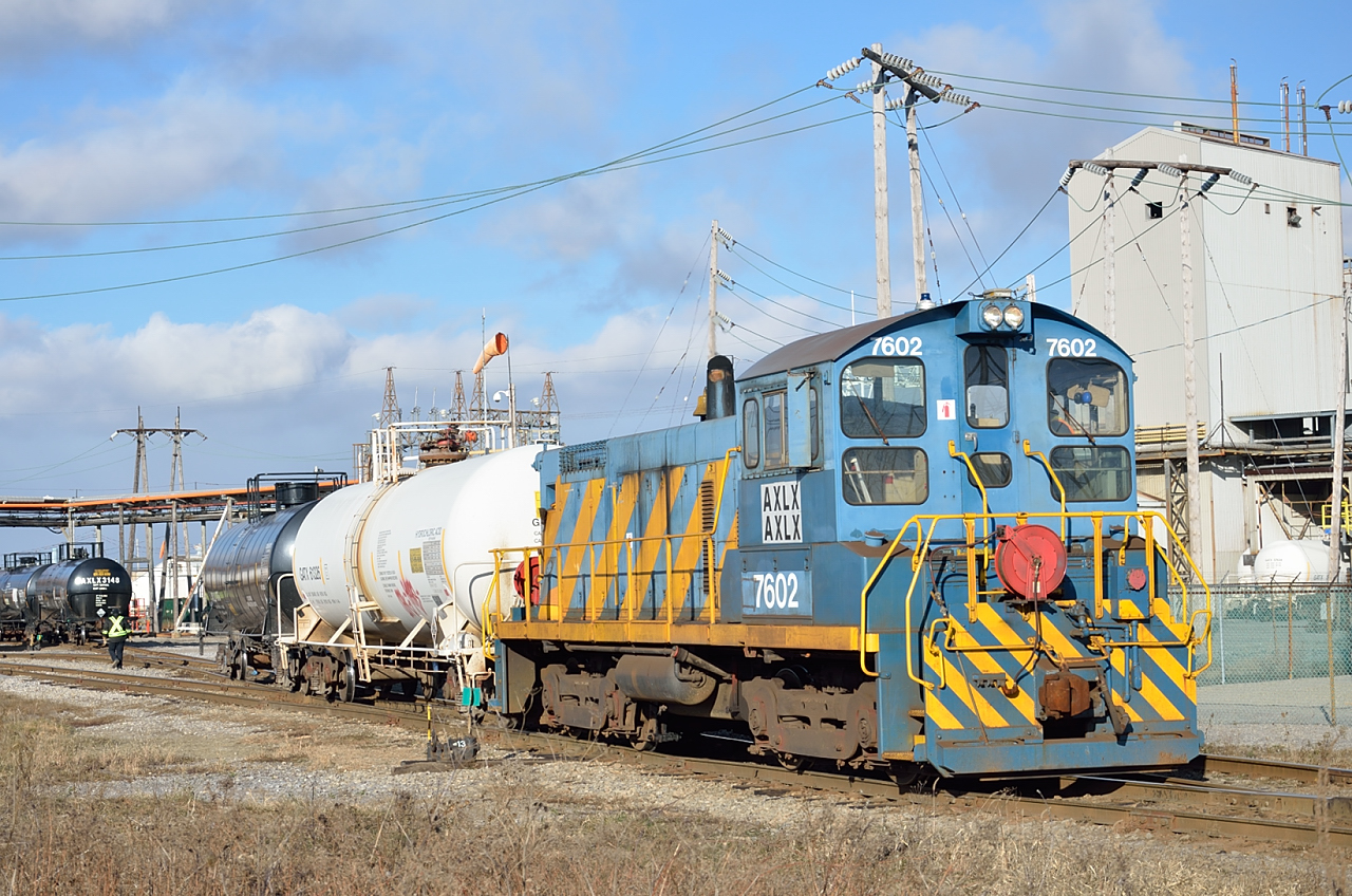 Former Port of Montreal (once known as the National Harbours Board) SW1001 #7602 now works at the former Standard Chemical plant in Beauharnois, Quebec. Cars from the plant are delivered to CSX.