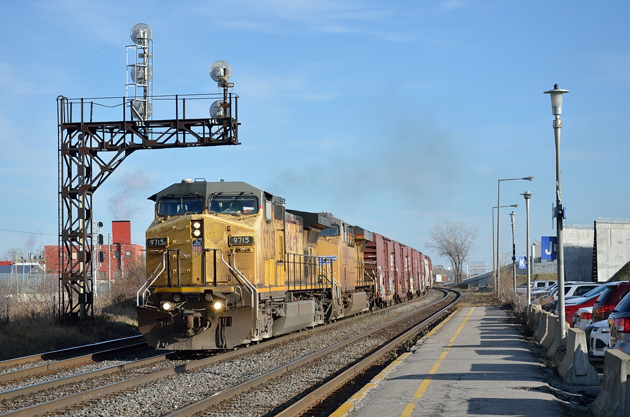 CN 327 follows a circuitous route from CN's Taschereau Yard in Montreal to CSX's Selkirk Yard in Albany, NY.  It departs westbound from Montreal on the Kingston sub as far as Coteau Jct where it turns east on the Valleyfield sub to Cecile Jct.  At Cecile Jct it turns south on CSX rails eventually reaching Syracuse NY.  At syracuse it heads east along the Water Level Route to Selkirk.

For most of the year 327 operates to and from Montreal with CSX power.  However, CN power takes over toward the end of the year as horsepower hours are equalized.  But in this case two UP units haul the train through Dorval.