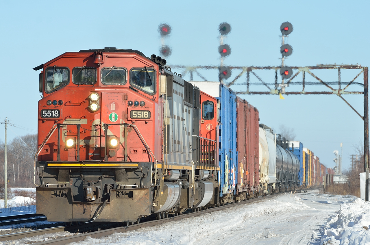 CN X371 roars through Coteau on a cold winter's day.