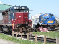 On a trip to Goderich in May 2008, we came across numerous GEXR locomotives resting in the yard. Here we see HLCX 6522 (an SD45 I think) posing beside a familiar locomotive - the RailLink F unit, RLK 1401, which is now part of the OSR fleet. Also note the piece of equipment between the two locomotives. I leave this open for discussion.
