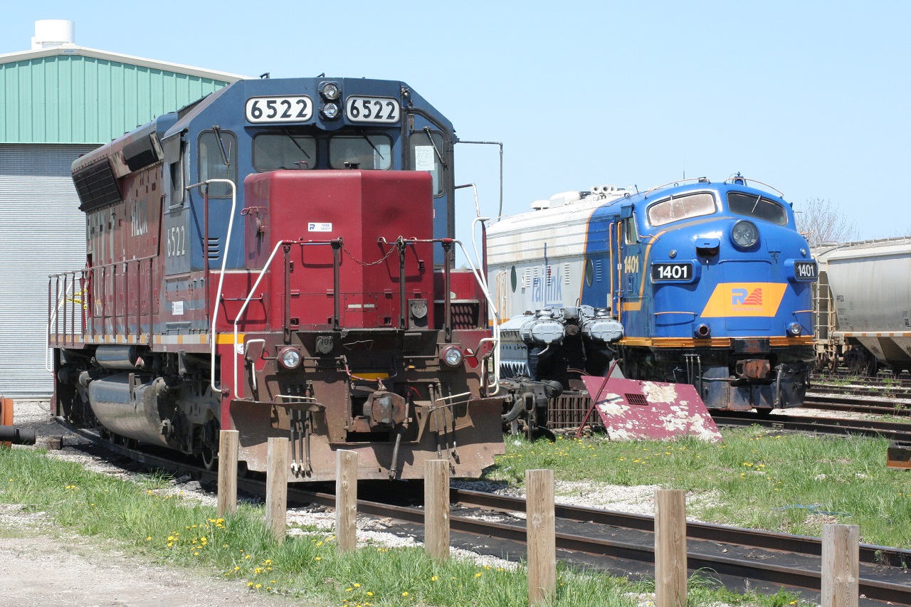 On a trip to Goderich in May 2008, we came across numerous GEXR locomotives resting in the yard. Here we see HLCX 6522 (an SD45 I think) posing beside a familiar locomotive - the RailLink F unit, RLK 1401, which is now part of the OSR fleet. Also note the piece of equipment between the two locomotives. I leave this open for discussion.
