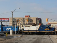 <b>Downtown Disturbance</b>  The horn of RLK 4003 breaks the silence in downtown Brantford as SOR 496 crosses Colborne Street on their return run to Brantford yard after working the Ingenia Polymer Plant at the end of the Burford Spur.  This is the third week of the SOR servicing Ingenia, making the Burford Spur a little more interesting than usual.