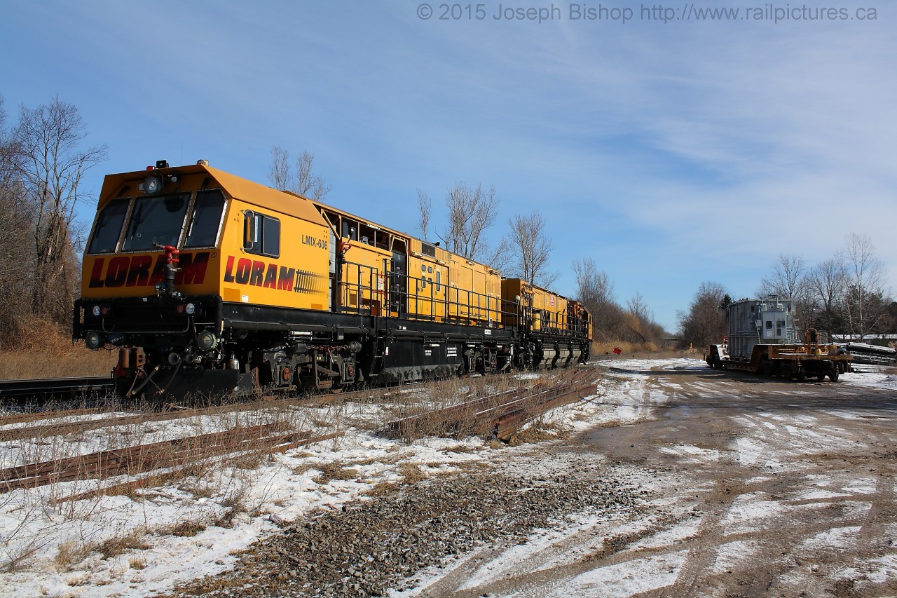 Railpictures.ca Joseph Photo The Loram switch grinder sits in