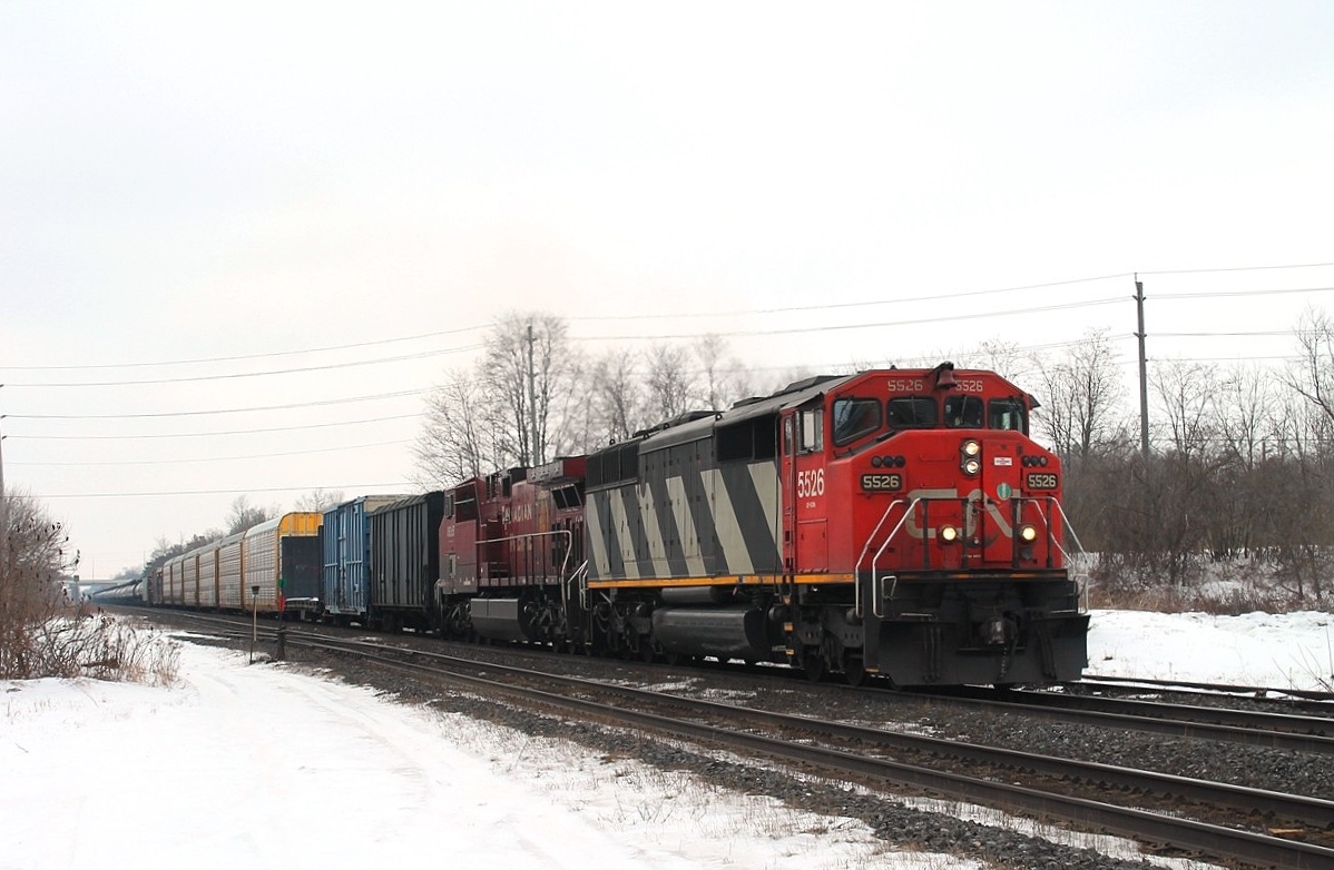 An eastbound mixed freight pulled by CN 5526 and CP 8655. The first time I have seen a CP loco on the main at Ingersoll!