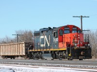 CN 7000 arrives from Brantford pushing one gondola into the yard before returning light engine.