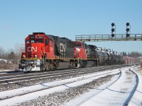 #331 approaching Paris yard to make a lift. CN 5411 and 2162 lead the mixed freight.