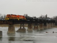 SOR 597 creeps across the Caledonia bridge with RLHH 3404 and RLHH 3403 keeping their train of 75 tank cars in check.  It was a gloomy first day of 2015 but the orange SD's added some brightness!  Thanks to James for the heads up this morning...made for a great first catch of 2015, here's to a great year!
