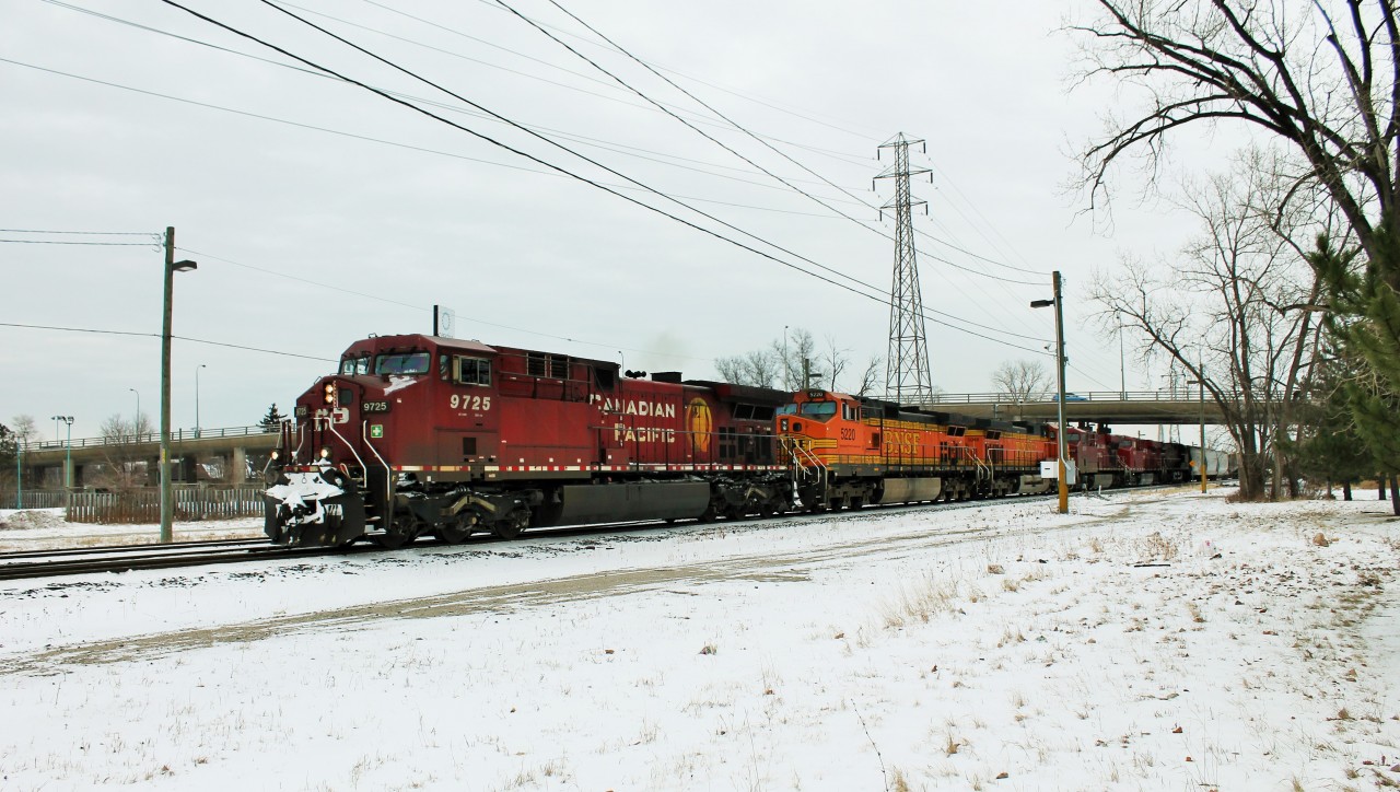 This was one of those times when I think I'm psychic or something like that. I was sitting at home working on a couple of HO Scale ethanol tank cars (ironically 641 is an ethanol train) when I heard 641 asking for clearance on the scanner. I decided to go catch it without even knowing what power was on it. I beat it to Dougall with about 2 minutes to spare and after it passed me I went down to the tunnel to see it again.