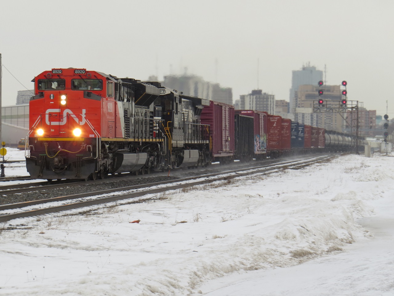 On a cold gloomy day, M382 makes it way through London during a break in the snow.